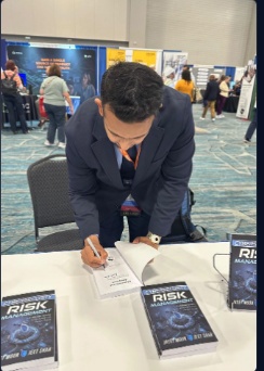 Jayet Moon at ASQ conference booth